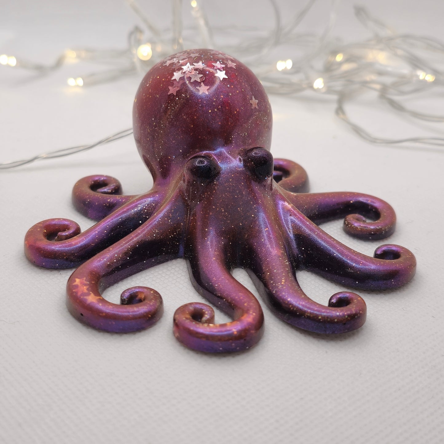 Octopus ornament- pink and purple colour-shifting pigments and star-shaped glitter