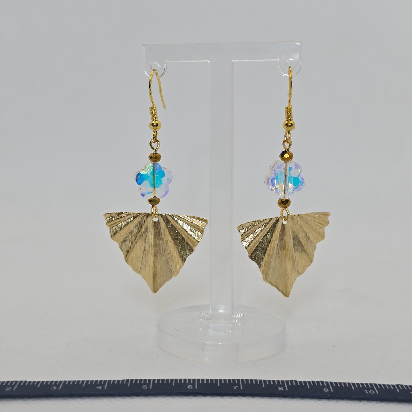 Earrings- Brass fan-shaped dangle enhanced with crystal flower shaped bead