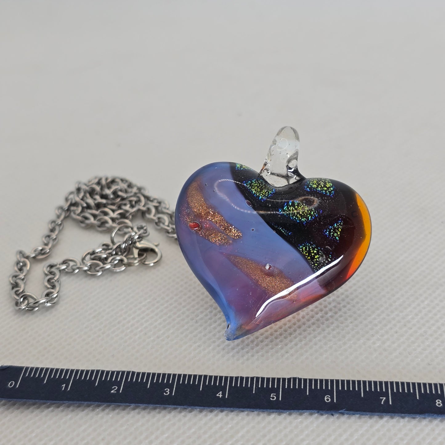 Dichroic glass pendant, heart-shaped