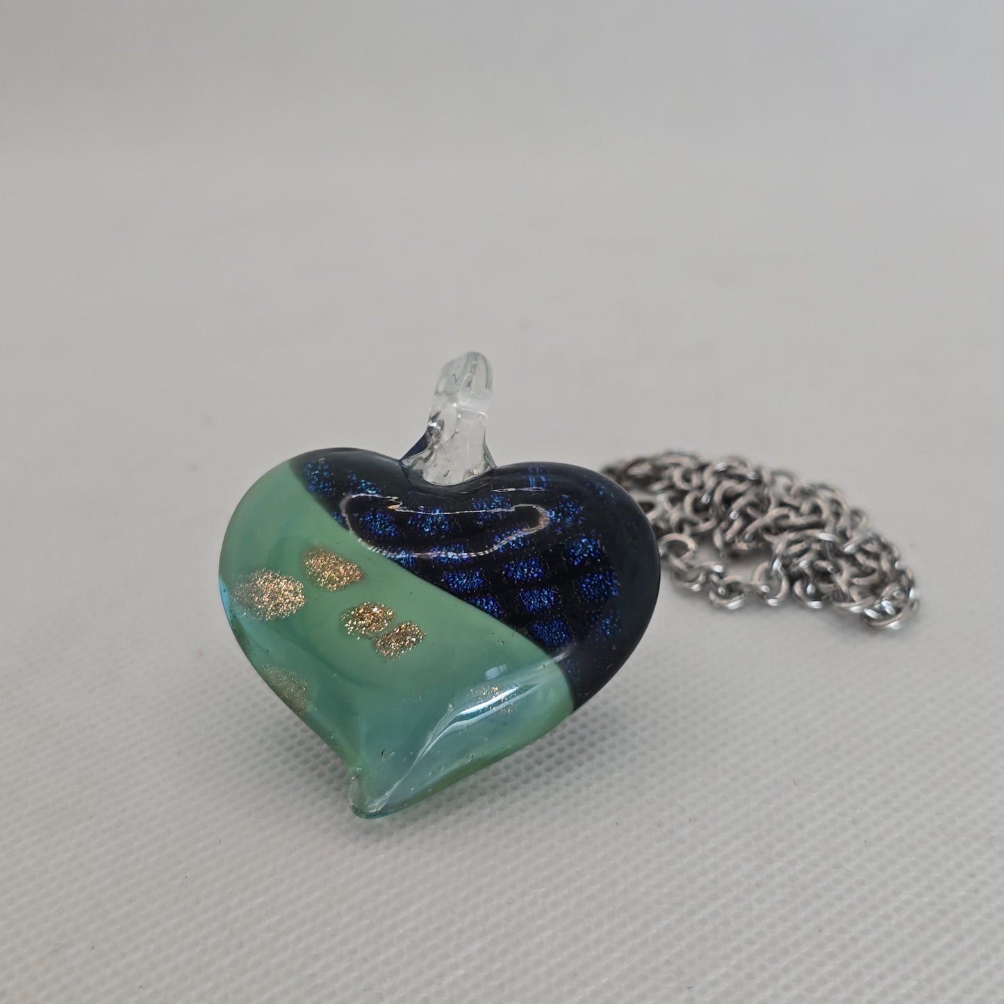 Dichroic glass pendant, heart-shaped