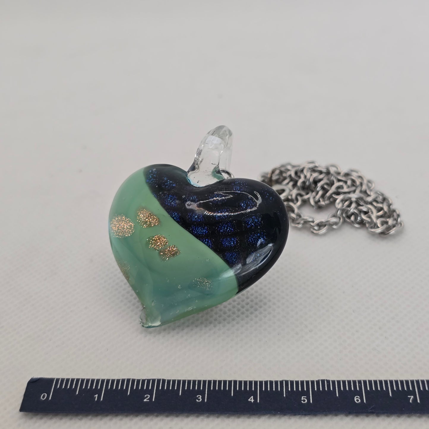 Dichroic glass pendant, heart-shaped