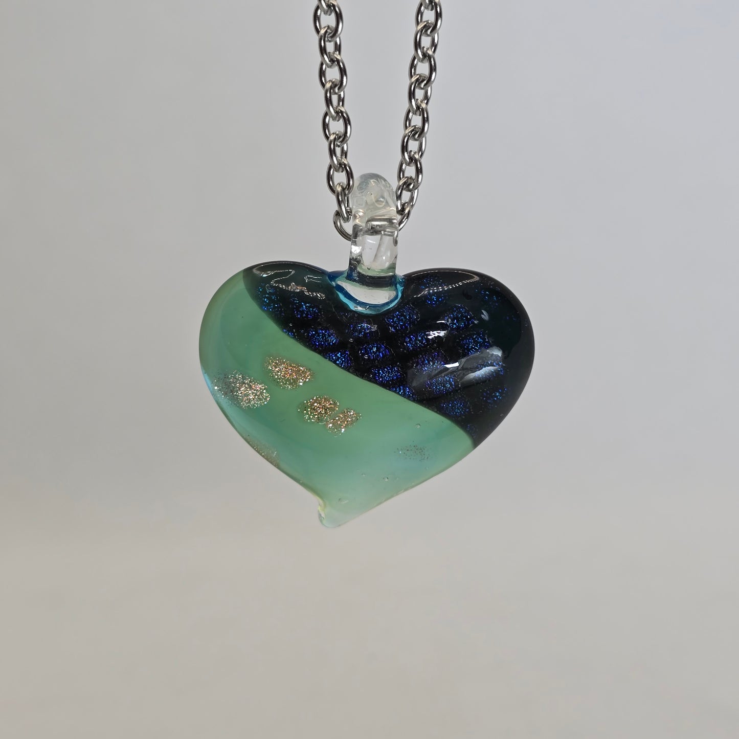 Dichroic glass pendant, heart-shaped