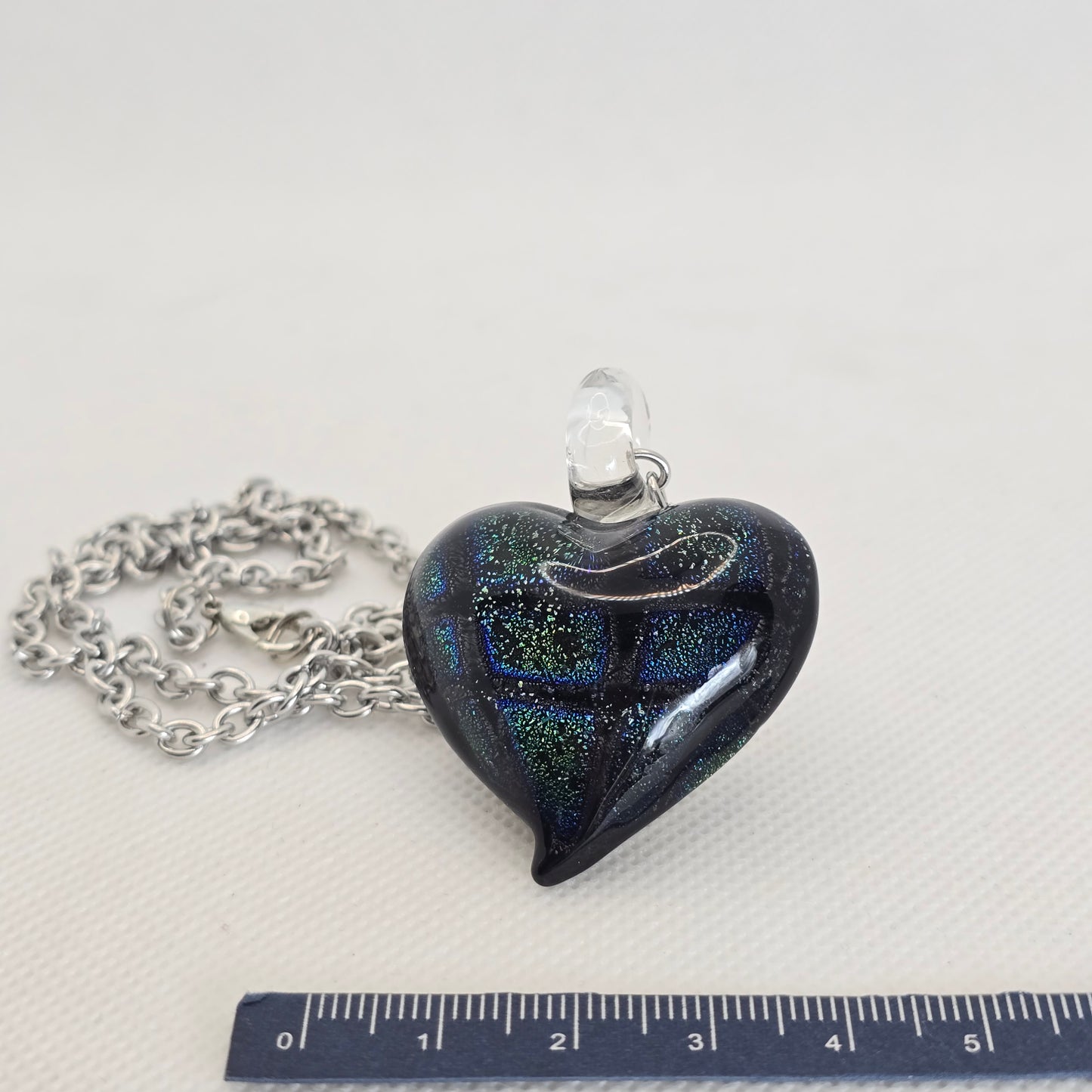 Dichroic glass pendant, heart-shaped