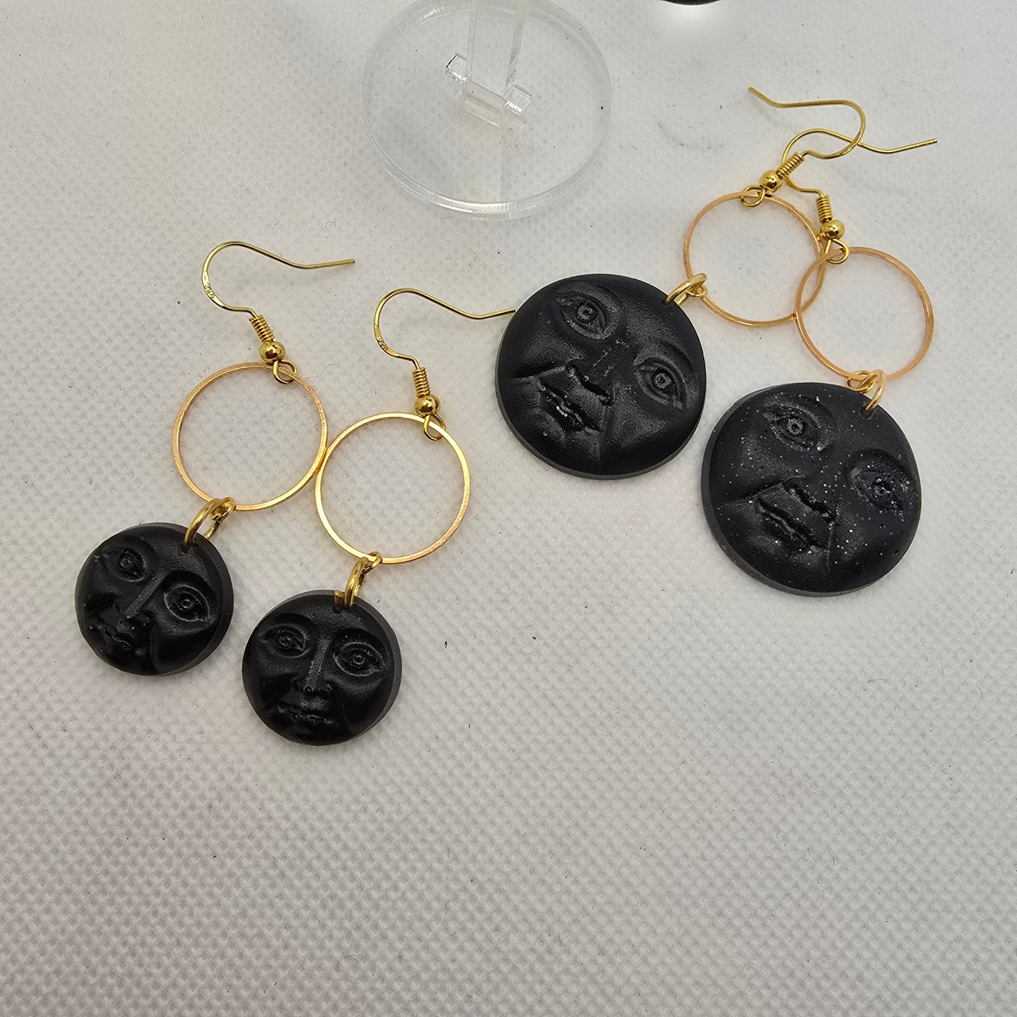 Moon-face earrings