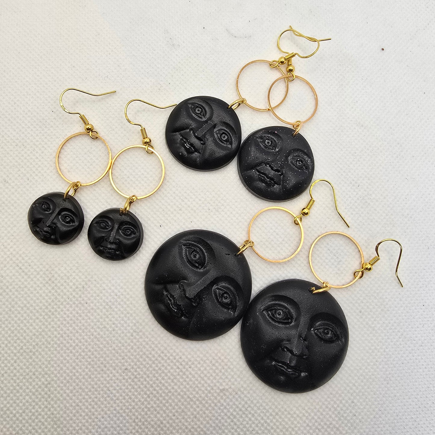 Moon-face earrings
