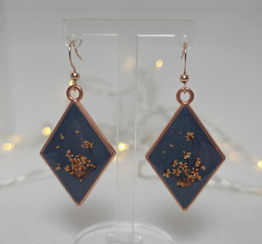 Earrings - Acrylic resin. Navy blue with white /yellow flowers in rose gold
