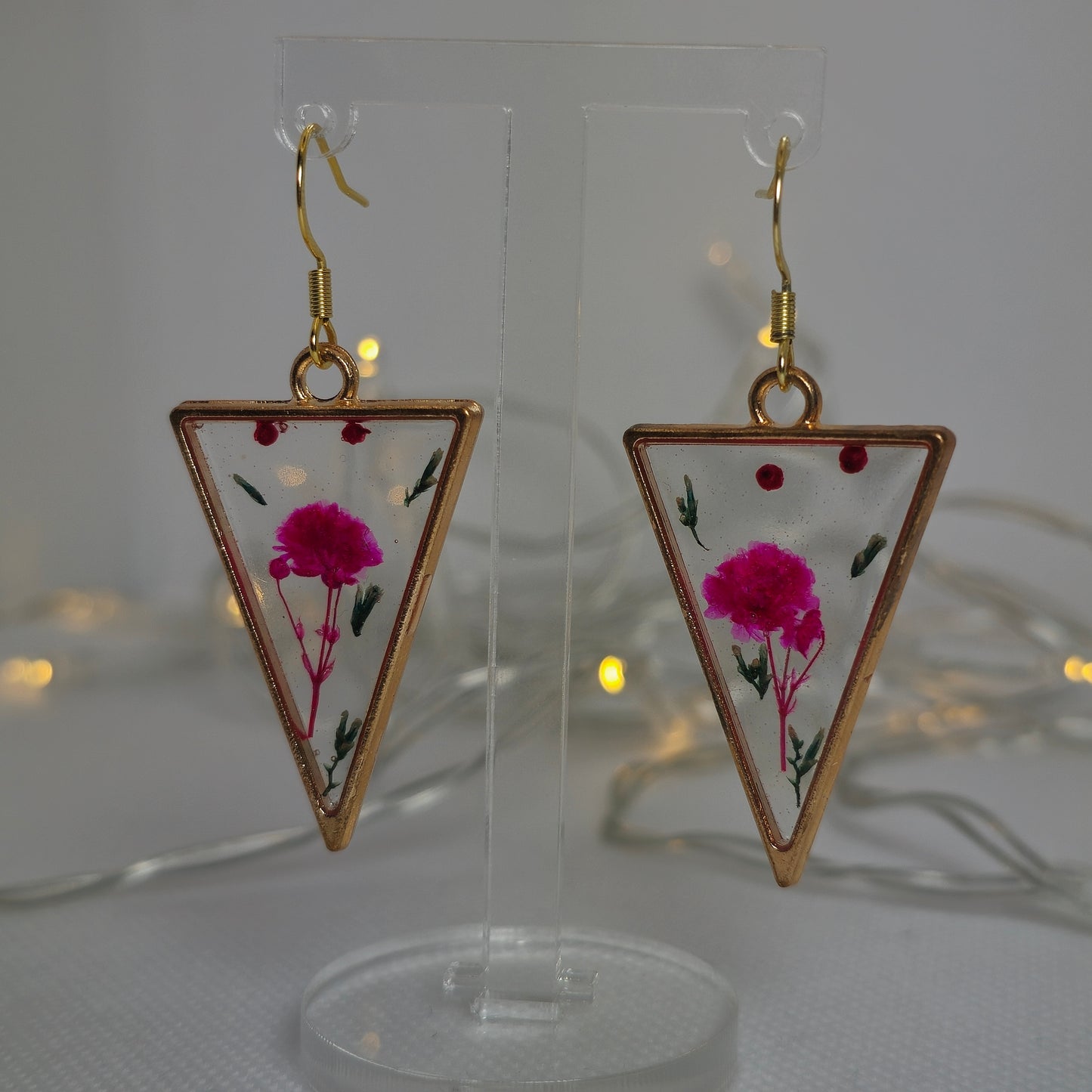 Earrings - Acrylic resin, showcasing a pink flower and delicate leaves, in a triangular frame
