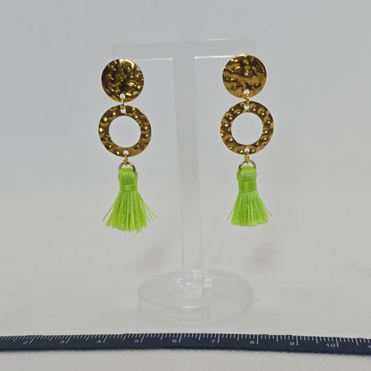 Earring- brass hammered effect circle with a lime green tassel, hanging from a brass hammered look post cover.
