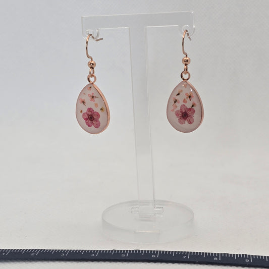 Earrings - Small bouquet of yellow Queen Anne's Lace flowers, in a round stainless steel bezel on a bed of white acrylic resin
