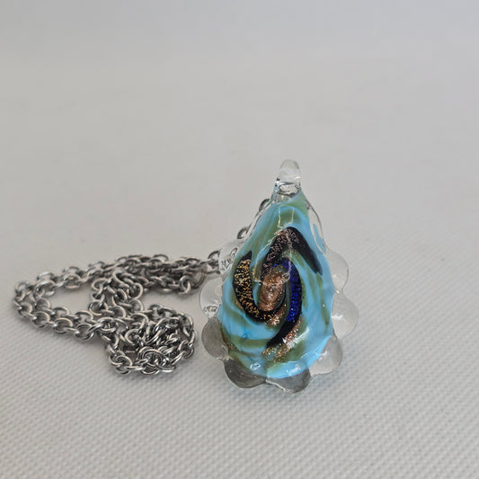Dichroic glass pendant, oval irregular shape